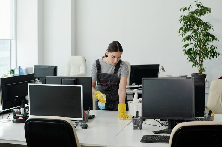 young-woman-coveralls-gloves-wiping-desk-large-openspace-office-274679-35140 Westchester-Office-Cleaning-Services
